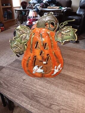 Orange Pumpkin Lantern with Green Leaves and Ghosts
